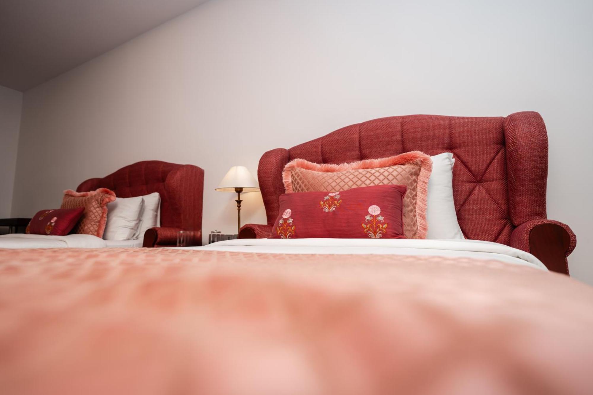 The Leela Ashtamudi, A Raviz Hotel Колам Екстериор снимка A bed